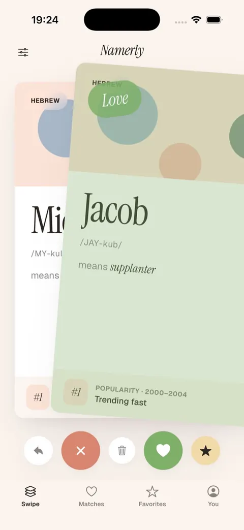 Namerly on iPhone: a card for the name Jacob, with its pronunciation and meaning, and buttons to swipe it away or like it